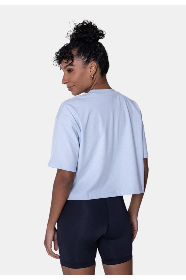 Produto Camiseta New Balance Cropped Small Logo Feminina Azul Bebê