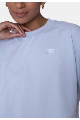 Camiseta New Balance Cropped Small Logo Feminina Azul Bebê Camiseta New Balance Cropped Small Logo Feminina Azul Bebê